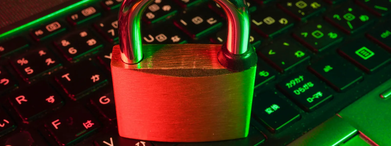 Padlock sitting on a computer keyboard symbolizing data protection