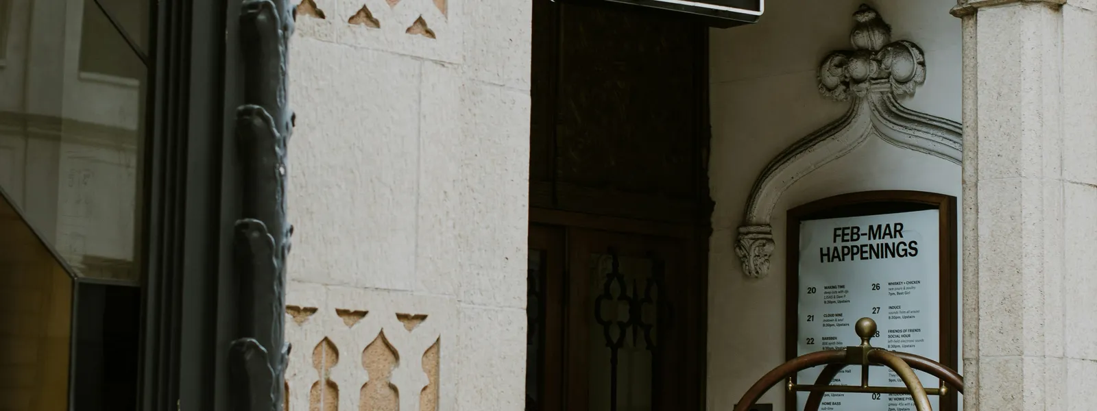 Elegant European hotel entrance with ornate classic facade